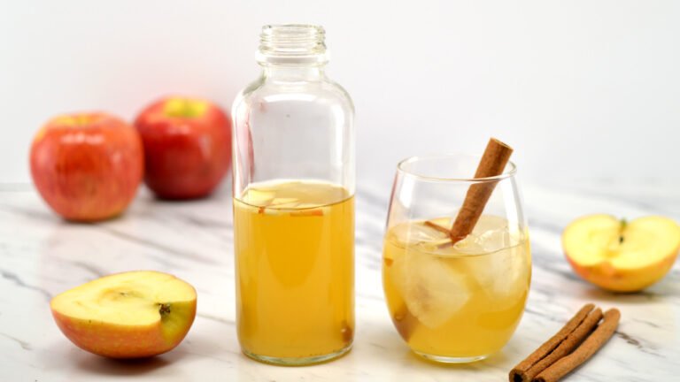 glass of apple cinnamon kombucha