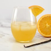 glass of orange creamsicle kombucha