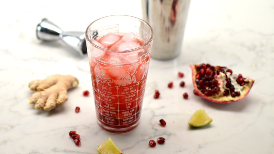 mixing sparkling pomegranate mocktail